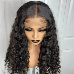 Curly long human hair extensions displayed on a mannequin showcasing beautiful natural curls and a natural-looking part.