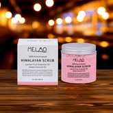 Himalayan salt body scrub product packaging with lychee fruit oil and sweet almond oil for glowing skin.