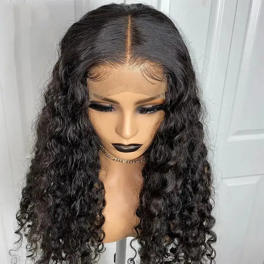 Curly long human hair extensions displayed on a mannequin showcasing beautiful natural curls and a natural-looking part.