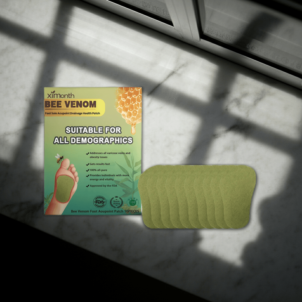 Detox foot patch packaging next to patches on a surface, promotes detoxifying and revitalizing feet.