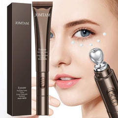 Eye cream for puffiness and dark circles in sleek packaging, applied near blue-eyed model's face.