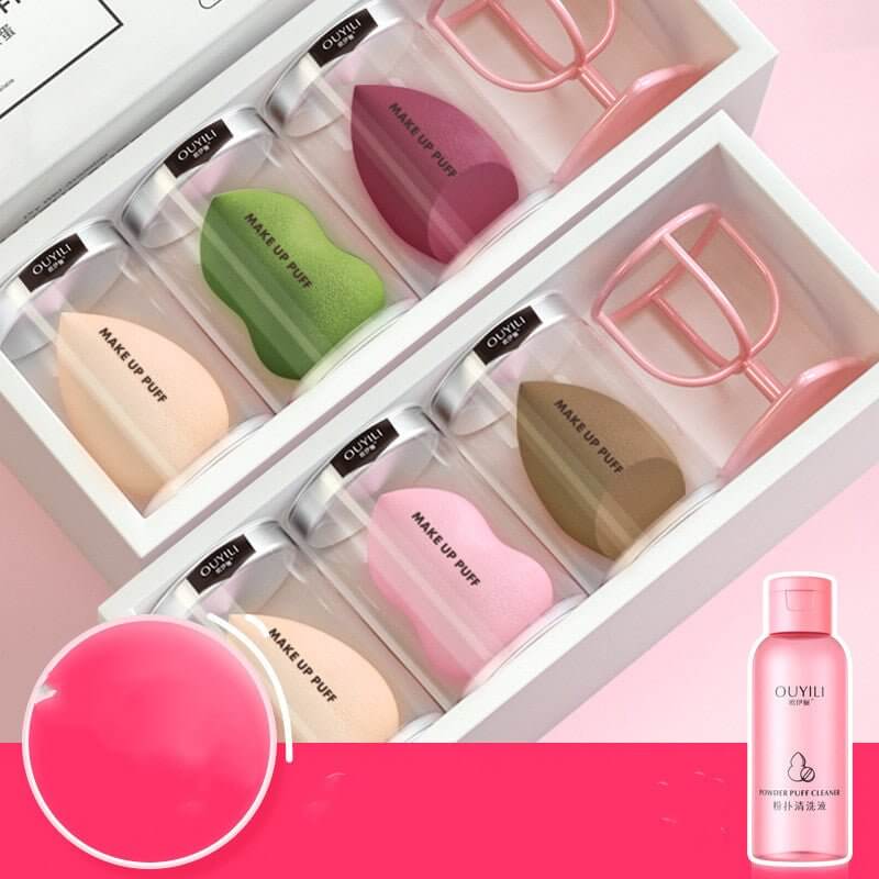 Makeup sponge beauty blender set featuring various colors and shapes in elegant packaging for flawless application.