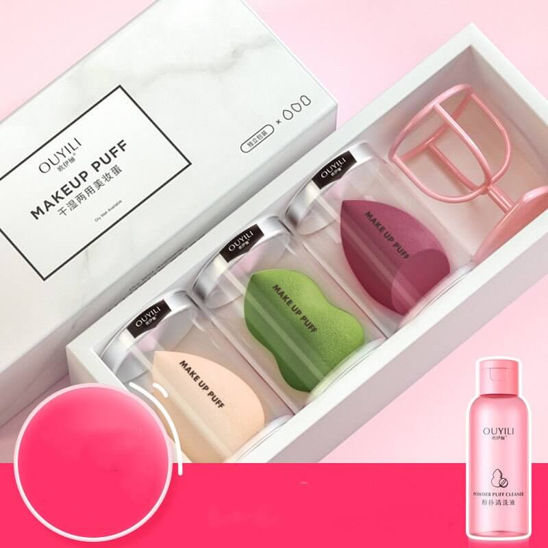Makeup sponge beauty blender set with various colors and included puff cleaner for flawless application.