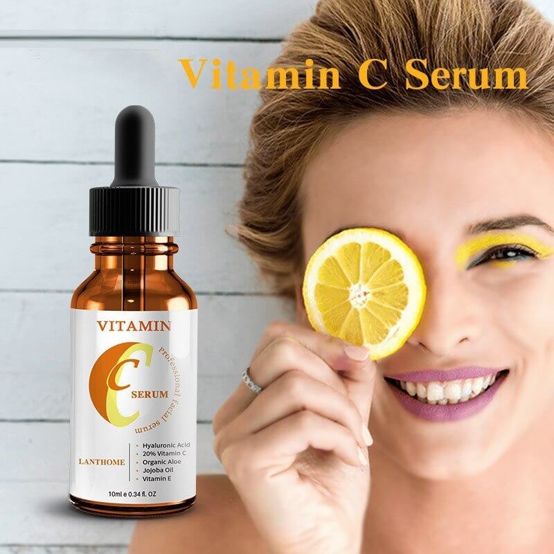 Vitamin C Hyaluronic Serum in a bottle next to a woman holding a lemon, promoting radiant skin.